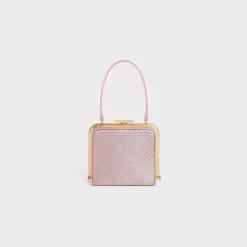 CELINE LANA MINAUDIERE in pearly python