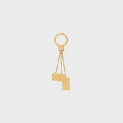 ENGRAVED MULTICHARM IN BRASS