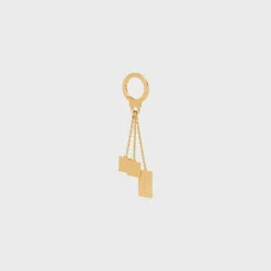ENGRAVED MULTICHARM IN BRASS
