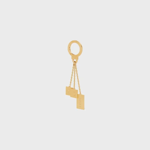 ENGRAVED MULTICHARM IN BRASS