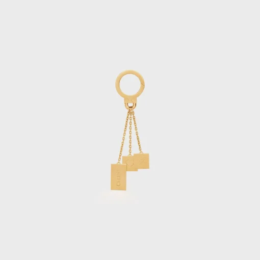 ENGRAVED MULTICHARM IN BRASS