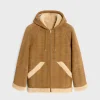 hooded parka in triomphe curly lambskin