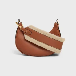 long strap in Shearling and calfskin