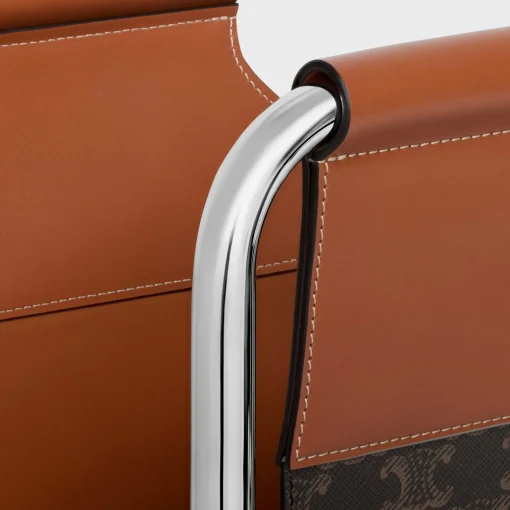 Magazine rack in triomphe canvas and aluminium
