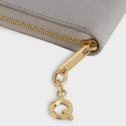 Q CHARM in Brass