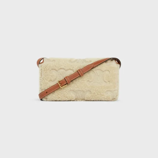 SHOULDER BAG CLAUDE in SHEARLING WITH TRIOMPHE EMBROIDERIES