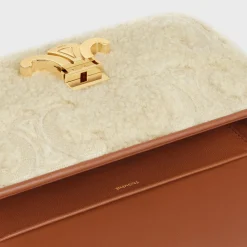 SHOULDER BAG CLAUDE in SHEARLING WITH TRIOMPHE EMBROIDERIES