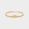 Triomphe Articulated Sparkle Bracelet in Strass and Brass with Gold Finish