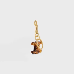 TRIOMPHE KEYRING CHARM in PLEXIGLASS with GOLD FINISHING