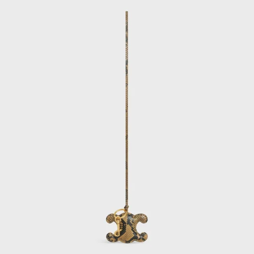 TRIOMPHE pom-pom keyring in PYTHON with Gold Finishing