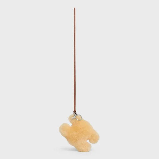 TRIOMPHE POM-POM KEYRING in SHEARLING AND SMOOTH CALFSKIN