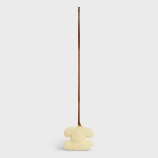 TRIOMPHE pom-pom keyring in SHEARLING AND SMOOTH CALFSKIN with Gold Finishing